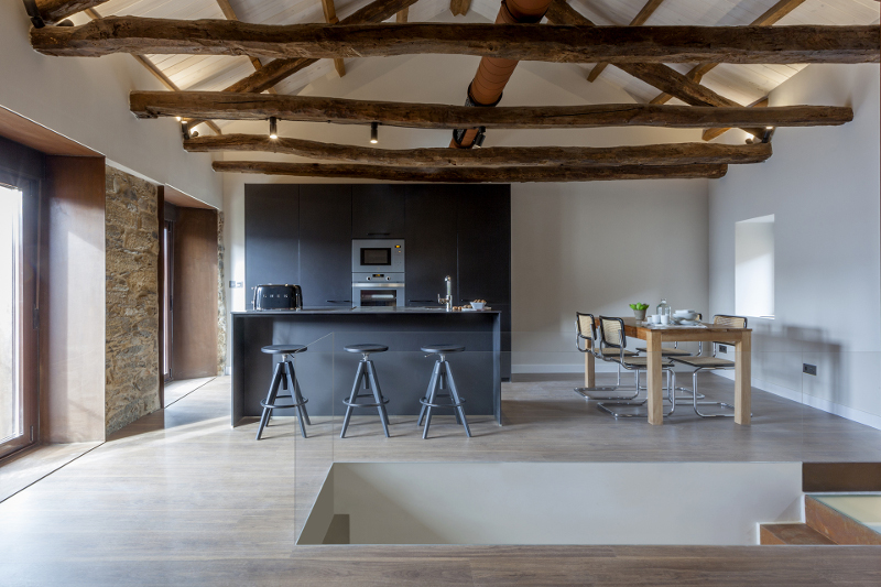 Santos Kitchens in renovated rustic homes