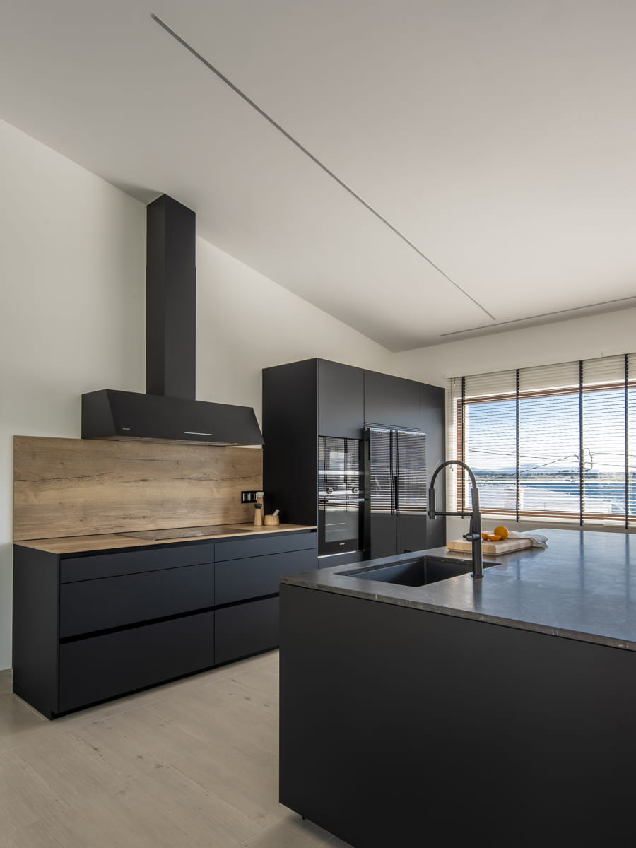 Black Santos kitchen with worktop and tall units