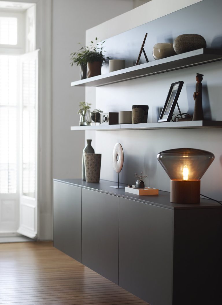 Grey dining room sideboard, with shelves and lighting