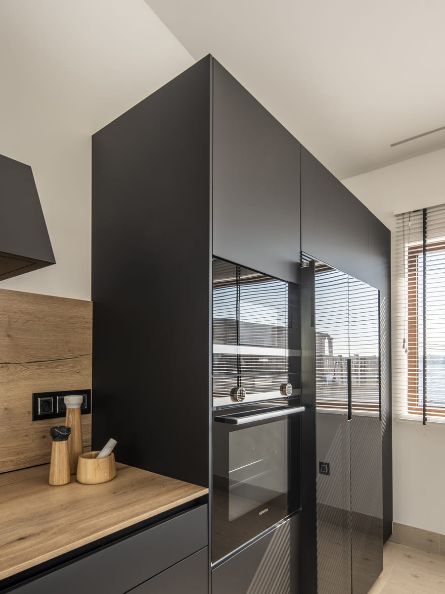 Black Santos kitchen with tall units and Santos units