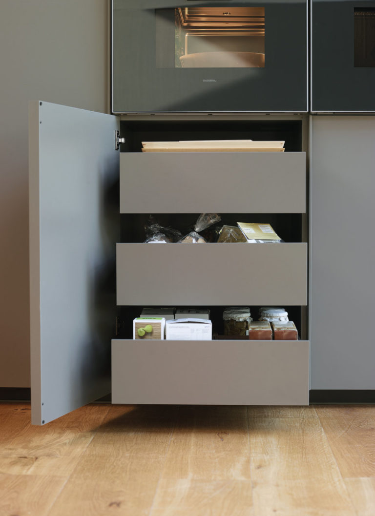 Full-extension double drawers in Santos tall units