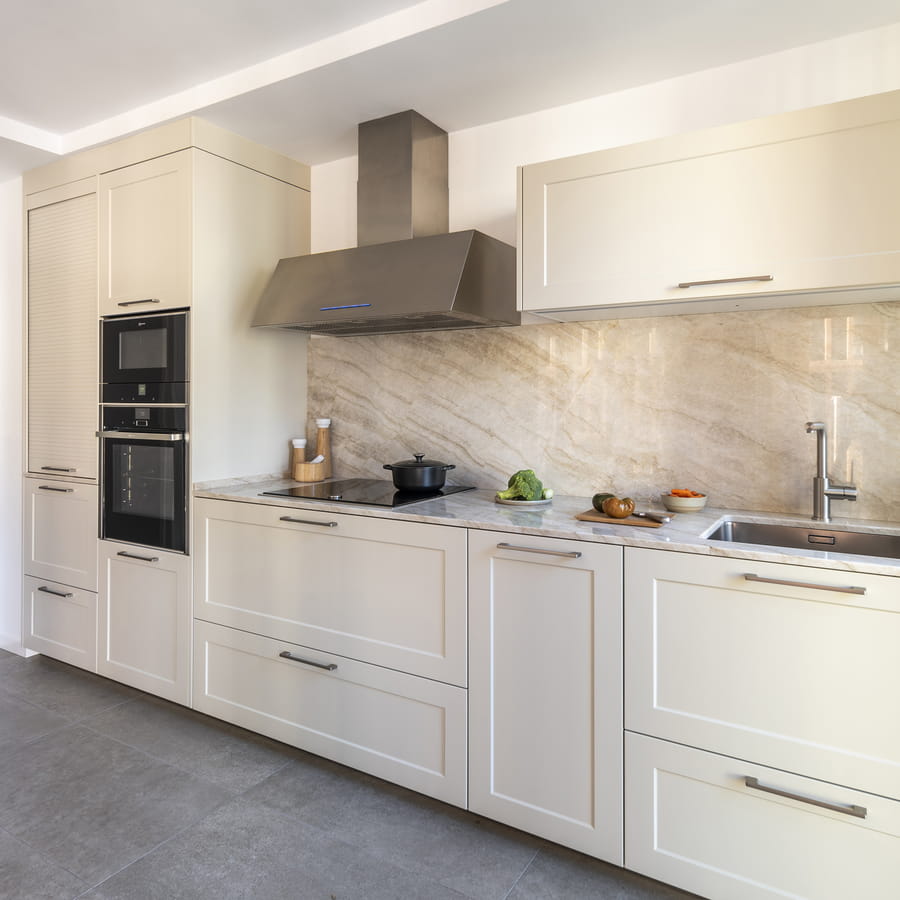 White kitchen with Santos furniture and extractor hood
