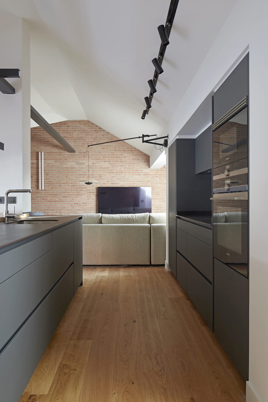 Kitchen open to the living room designed by architect Borja Vildosola