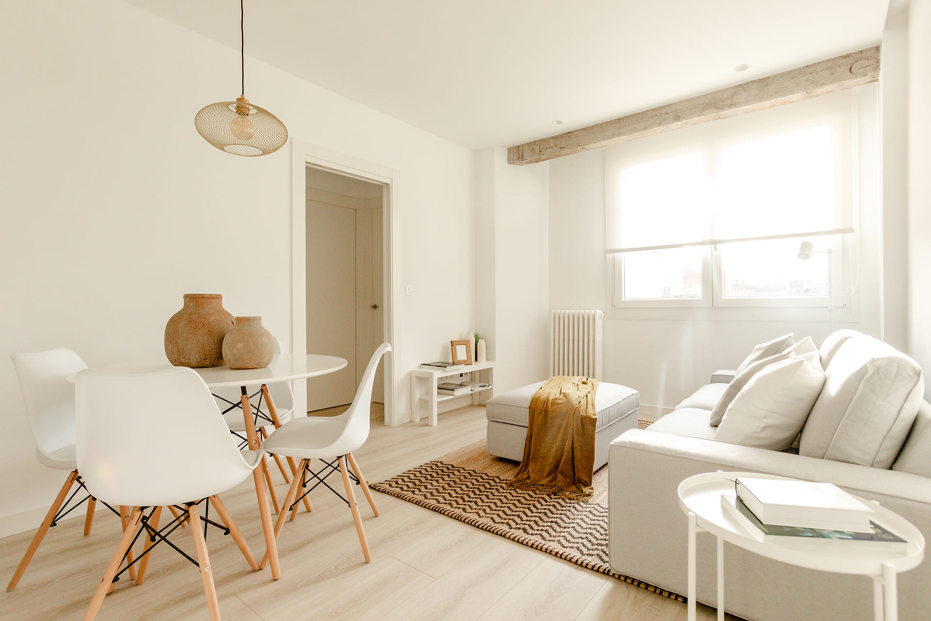 White living room in renovated flat