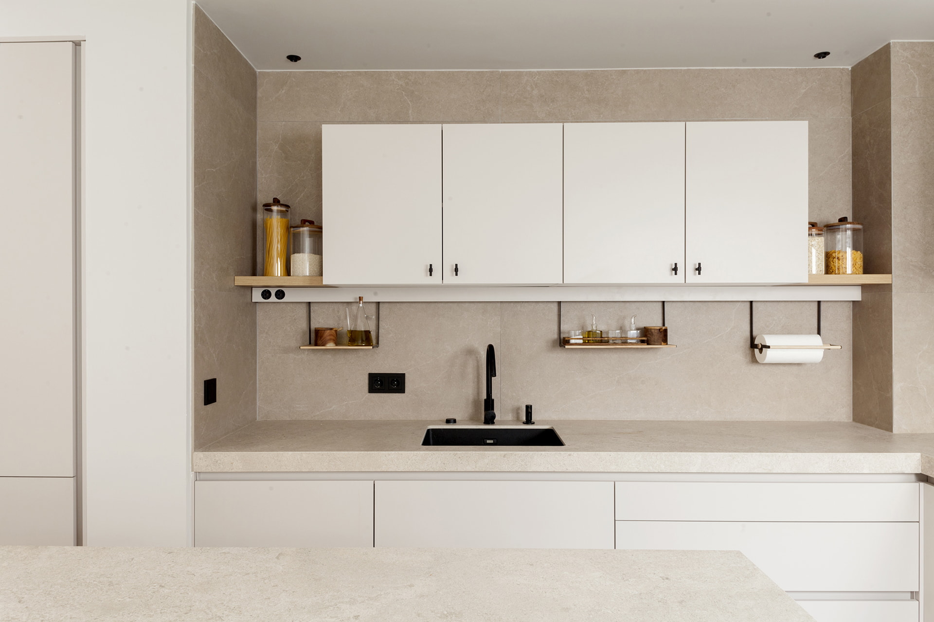 L-shaped white Santos kitchen in renovated flat