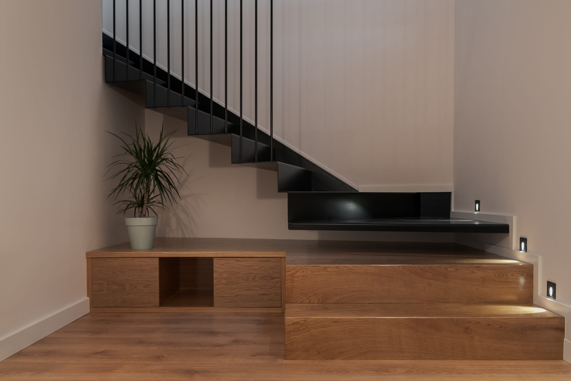Stair access in wood and black.