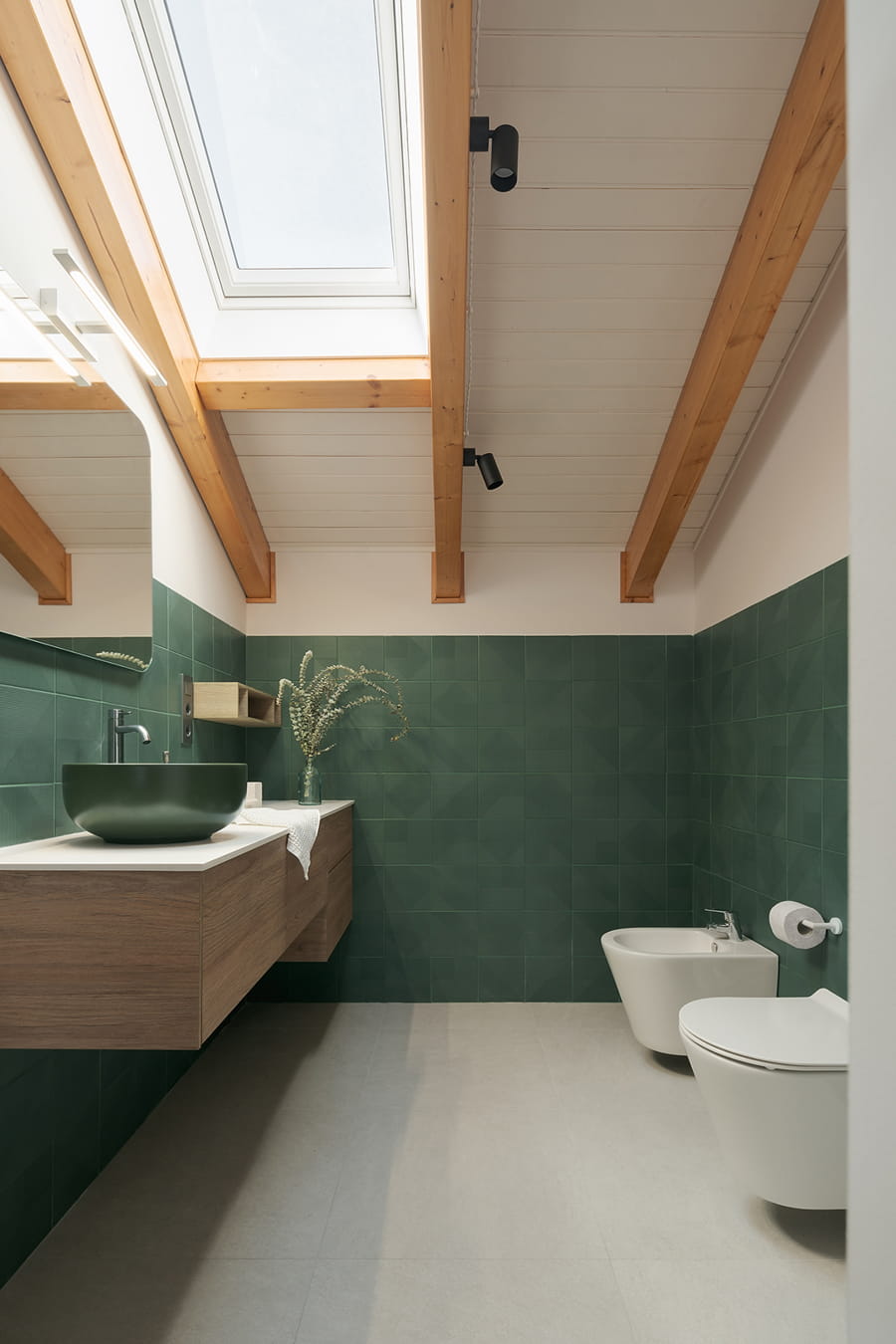 Modern bathroom with details in green.