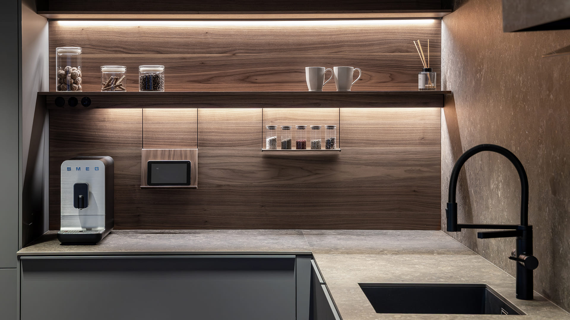 Silk Anthracite Grey and wood kitchen at the Santos kitchen showroom in Girona.