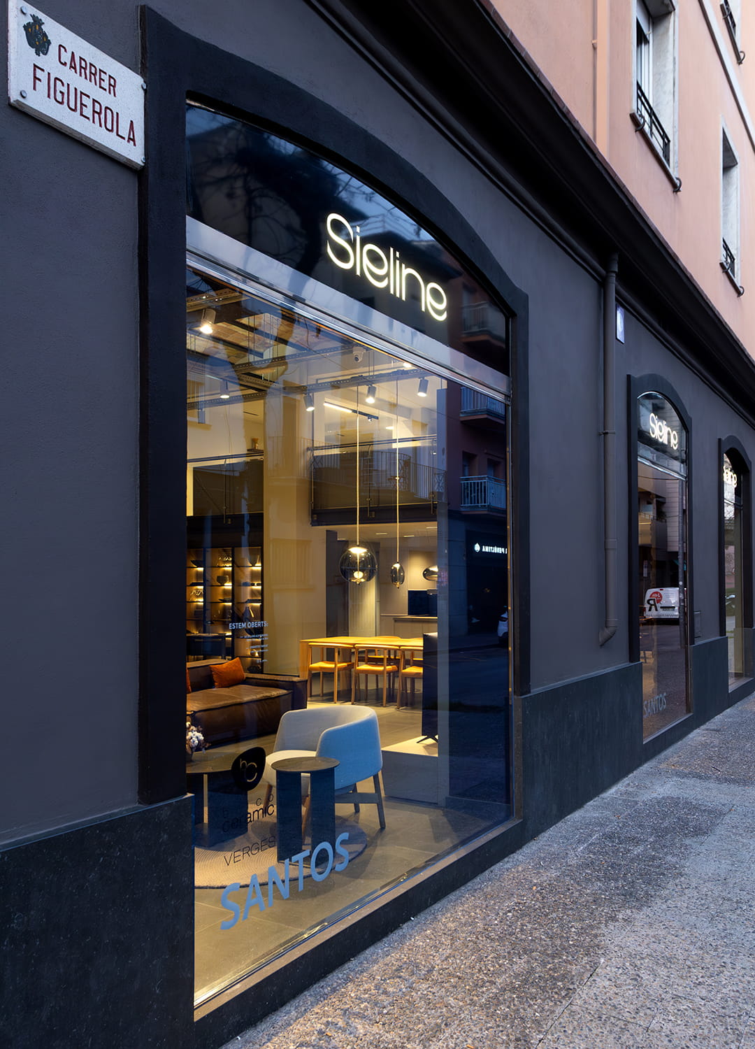 Outdoor display of the Santos kitchen showroom in Girona.