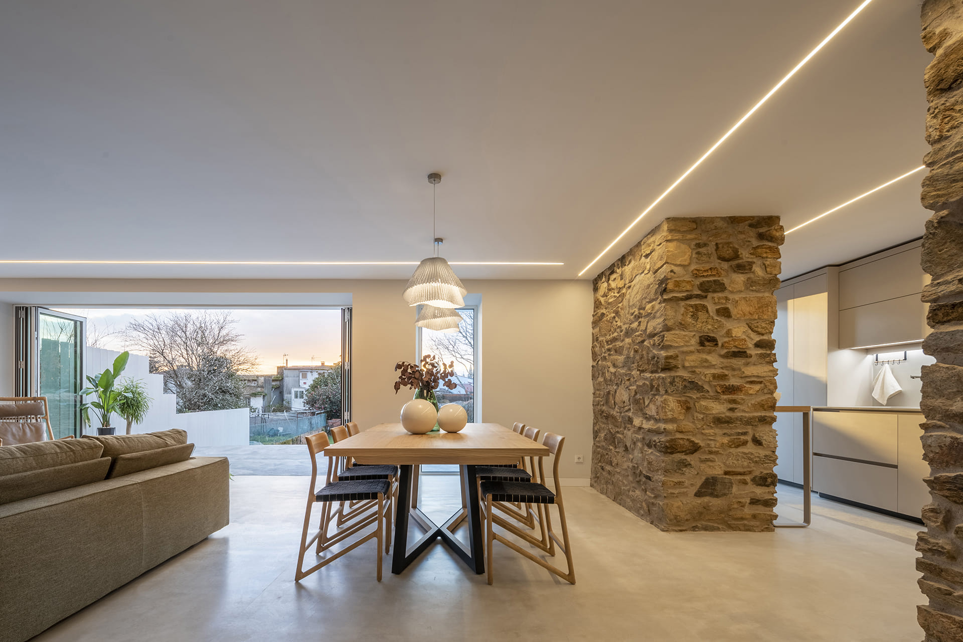 View of the lounge and diner together with a Cashmere Santos kitchen.