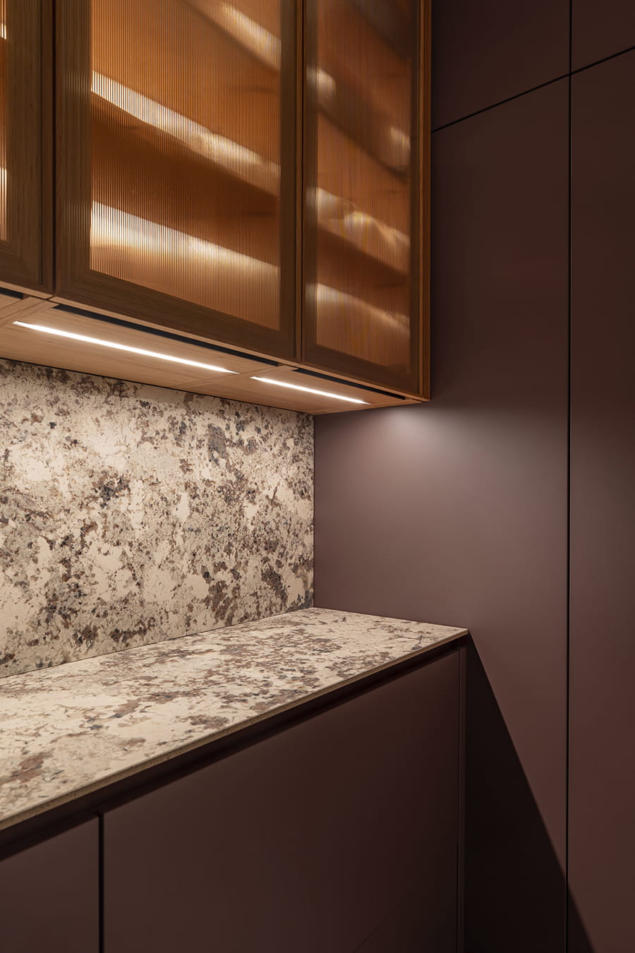 Close-up of a kitchen with laundry at the new Santos Kitchens showroom in Switzerland.