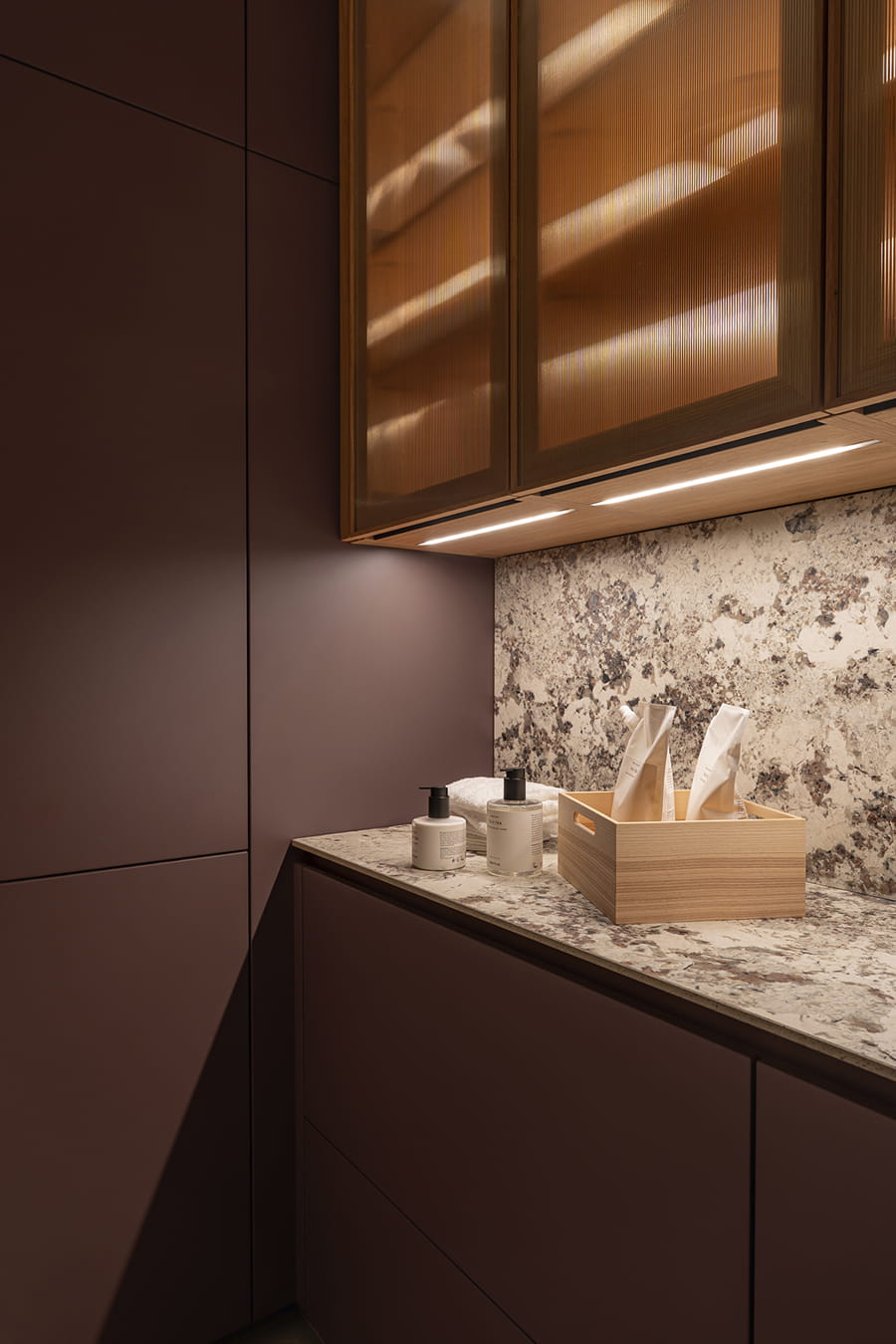 Kitchen with laundry integrated into the Santos kitchen showroom in Switzerland.