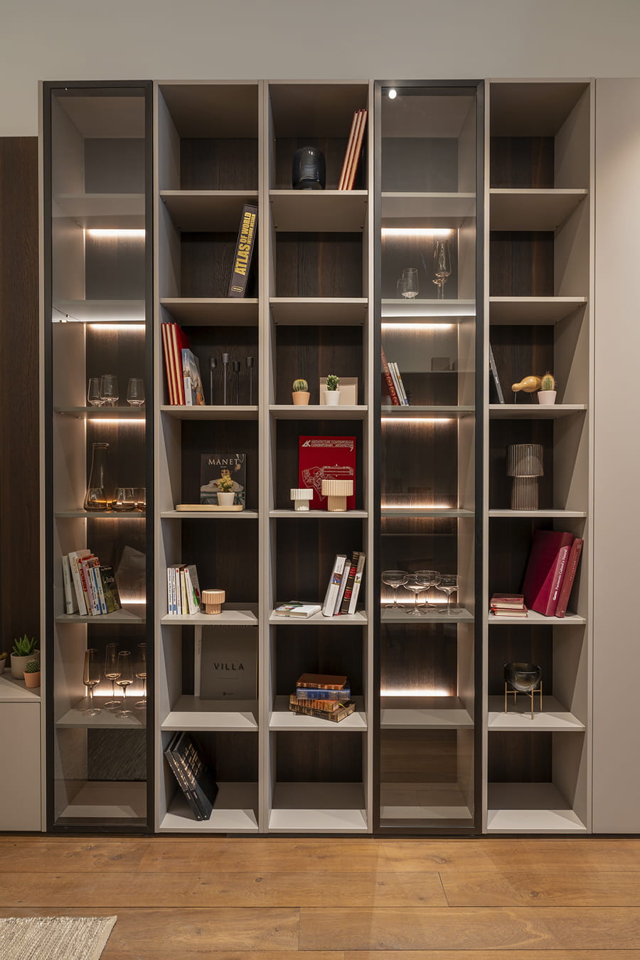 Glass door unit in the living area at the Santos Kitchens showroom eba Genève.