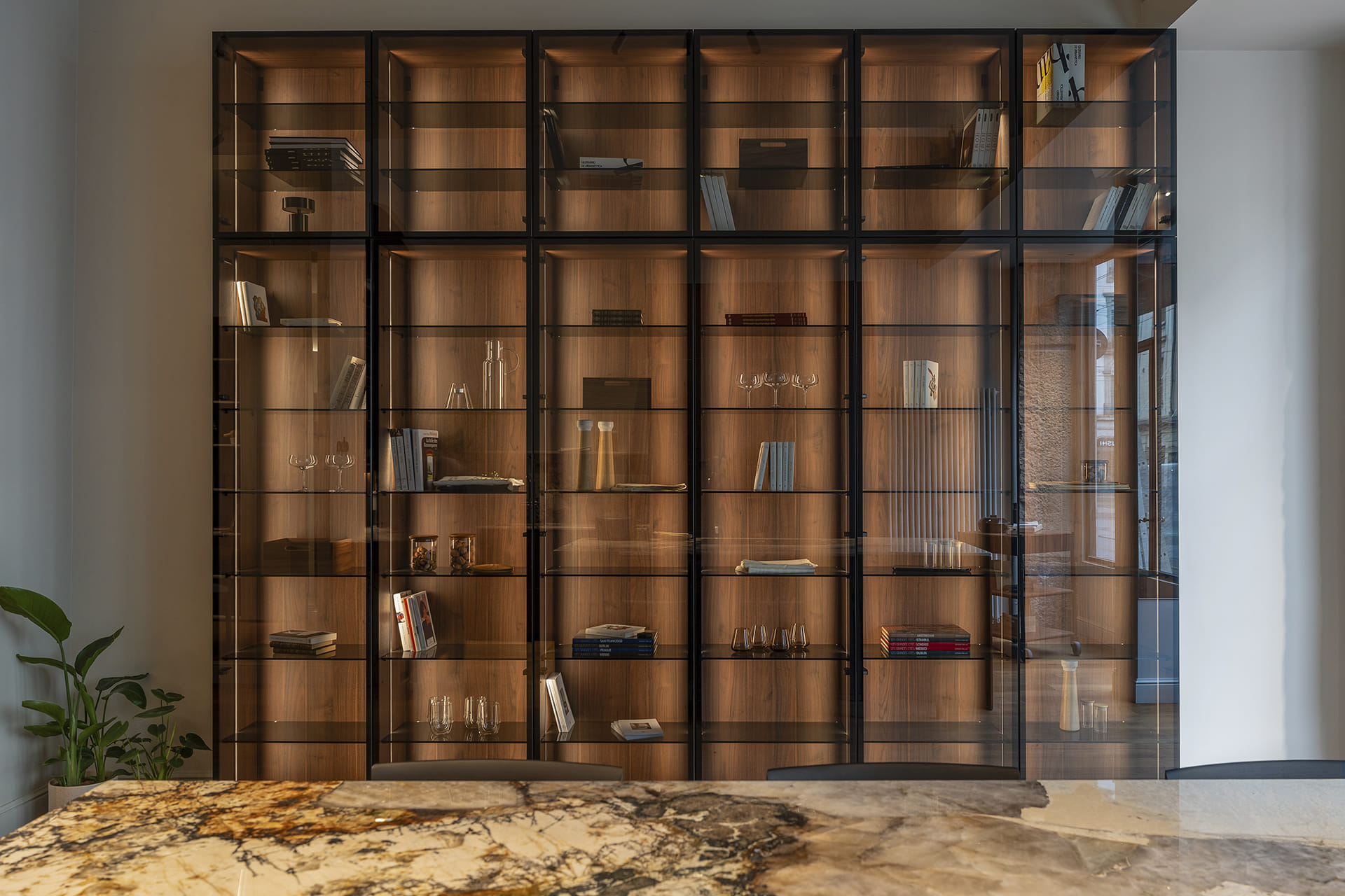 Glass door unit in the living area at the Santos Kitchens showroom in Switzerland.