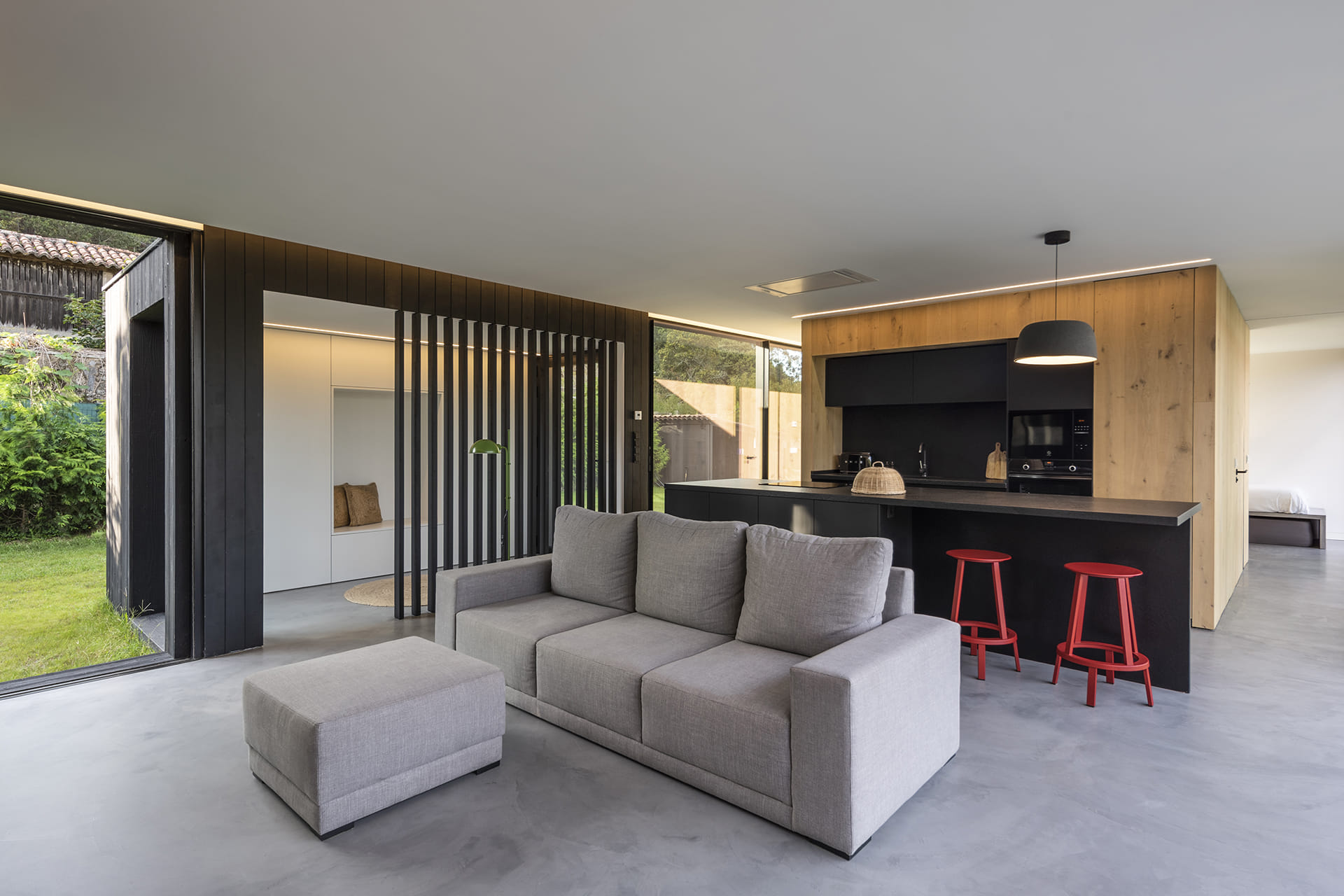 Home with a bright Santos kitchen open to the outside.